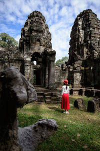 Woman visiting ancient temple