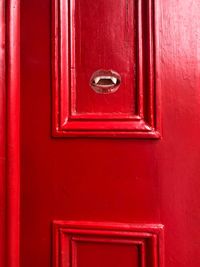 Close-up of closed red door