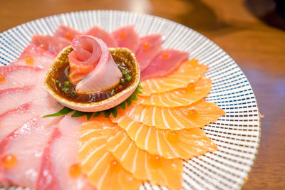 Close-up of strawberry in plate on table