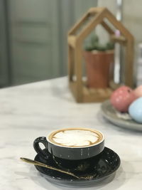 Close-up of coffee on table