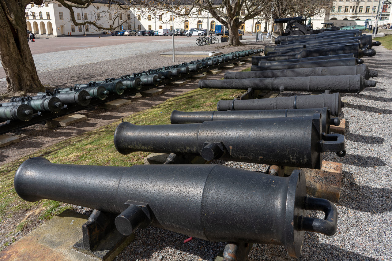 cannon, weapon, war, fighting, conflict, history, the past, architecture, military, metal, no people, day, city, built structure, vehicle, firearm, outdoors, nature, security, fort, building exterior, old, tree
