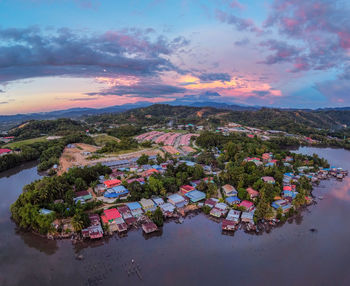 High angle view of lake against sky during sunset