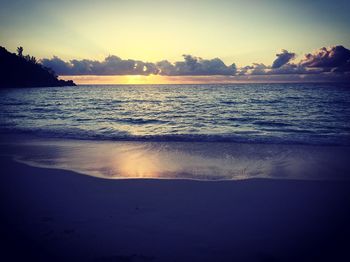 Scenic view of sea at sunset