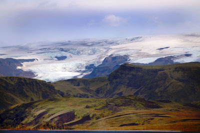 Scenic view of mountains against sky during winter