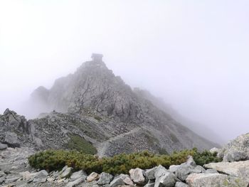 Scenic view of rocky mountains against sky