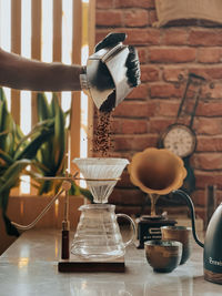 Close-up of coffee cup on table at home