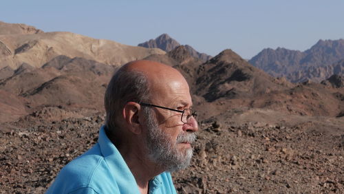 Portrait of senior man in the desert 