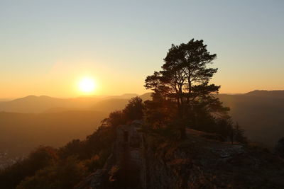 Scenic view of mountains against sky during sunset