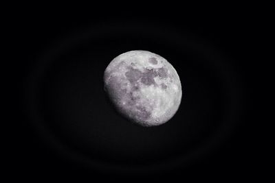 Low angle view of moon against sky at night