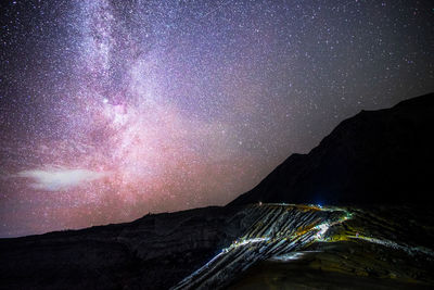 Scenic view of sea against sky at night