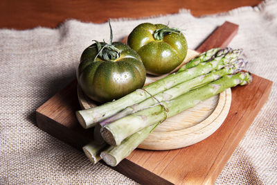 High angle view of vegetables on cutting board