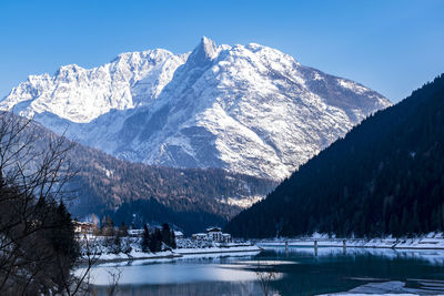 Scenic view of snowcapped mountains against sky