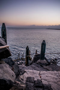 Scenic view of sea against sky at sunset