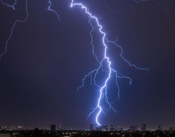Lightning strike behind the midtown phoenix, arizona skyline