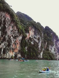 People on boat in sea