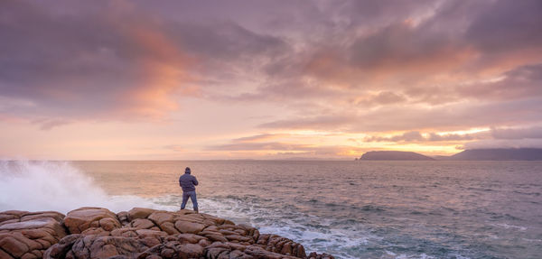 Scenic view of sea against sky during sunset