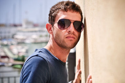 Male portrait of a guy with sunglasses