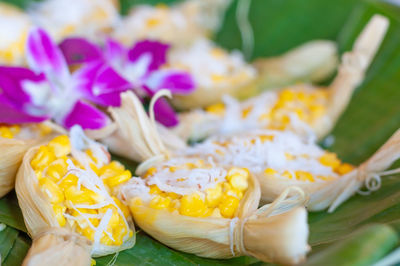 Close-up of yellow roses on plant