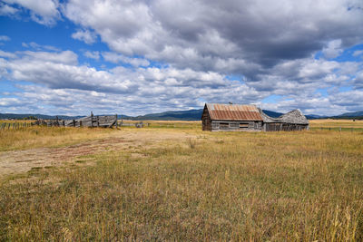 House on field against sky