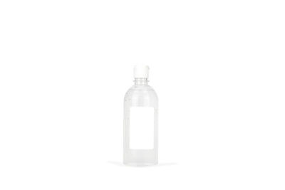 Close-up of empty glass bottle against white background