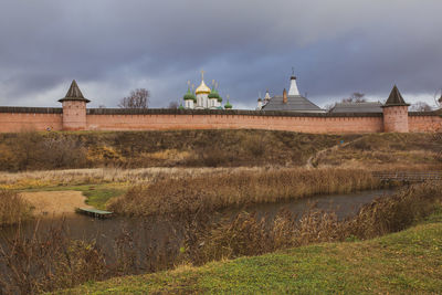 View of building against cloudy sky