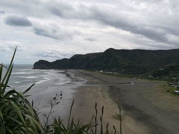 Scenic view of beach against sky