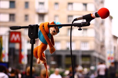 View of toy hanging on microphone