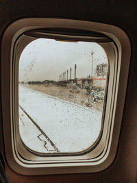 View of city seen through glass window