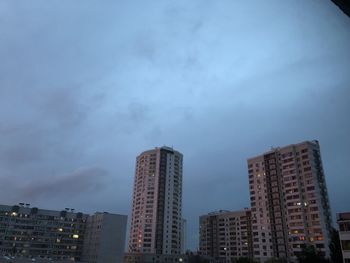 Low angle view of modern buildings against sky