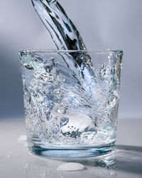 Close-up of ice crystals against glass