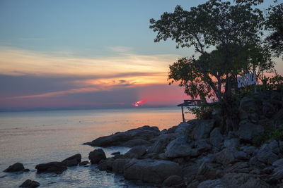 Scenic view of sea against sky during sunset