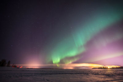 Scenic view of sea against sky at night