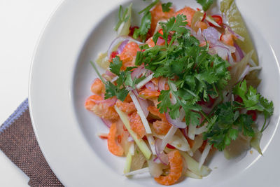 High angle view of salad in plate on table