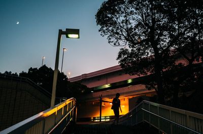 Low angle view of illuminated city at night