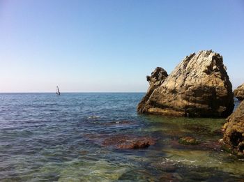 Scenic view of sea against clear sky