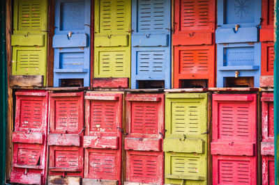 Multicolored wodden bee hives