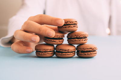 Close-up of hand holding cookies