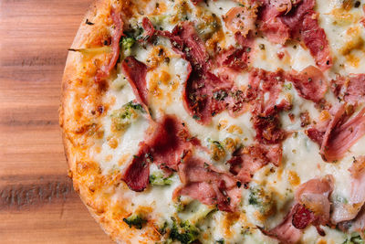 Close-up of pizza served on table