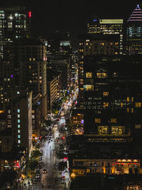 Illuminated city lit up at night