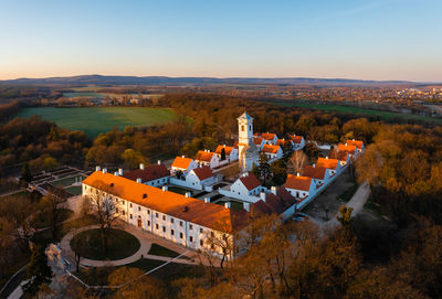 The famous baroque camaldolese monastery at majk on a spring morning from drone point of view.