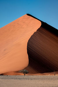 View of desert against clear sky