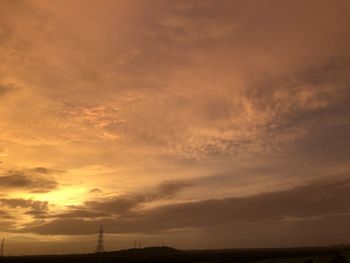 Low angle view of dramatic sky during sunset
