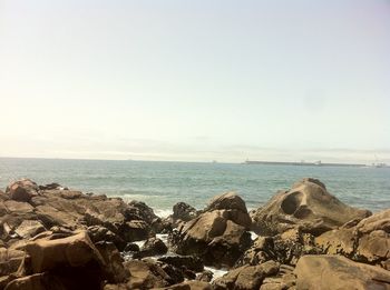 Scenic view of sea against clear sky