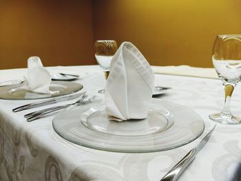 Close-up of place setting on table in restaurant