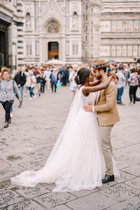 Full length of couple on road 