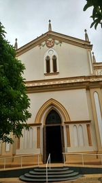 Low angle view of church against sky