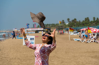 Happy woman at beach