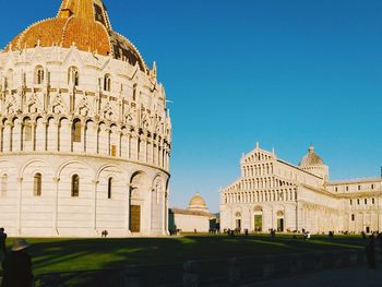 View of historical building against clear blue sky