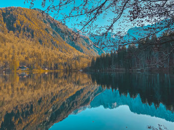 Scenic view of lake against sky during autumn