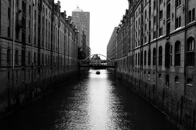 View of canal along buildings